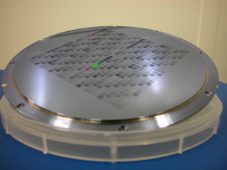 Hot-embossing stamp with sub-micro features